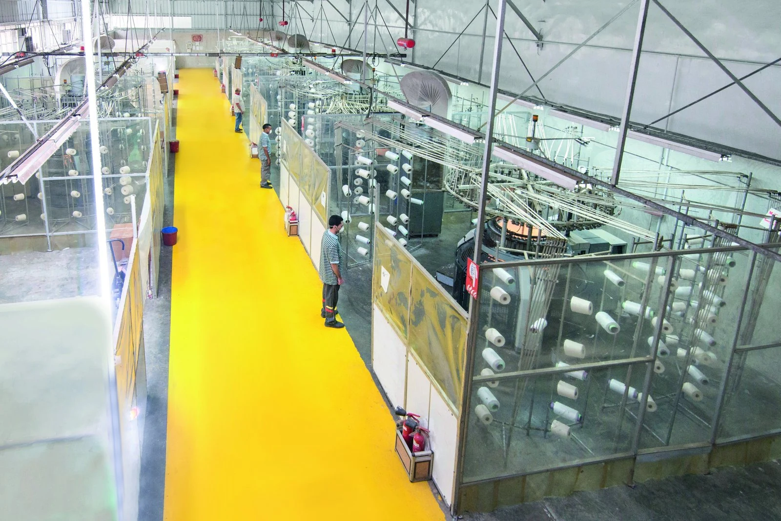 Circular knitting machines on the factory floor